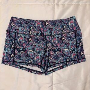 Feed Me Fight Me workout booty shorts with side pockets